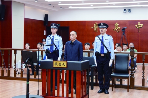 骆玉林在庭审现场 新华社发